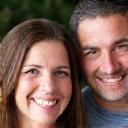 Portrait of a smiling couple, Sarah and Tom L.