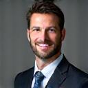 Professional headshot of a businessman, John D.